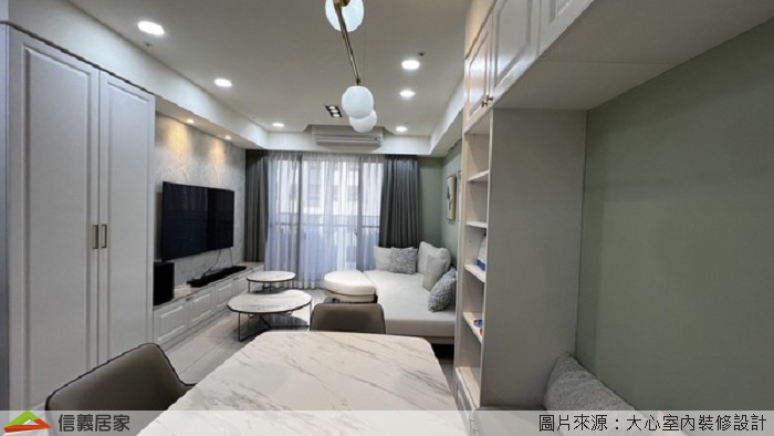 綠色客廳室內裝潢設計，包括收納櫃、吊燈、餐桌裝潢圖片